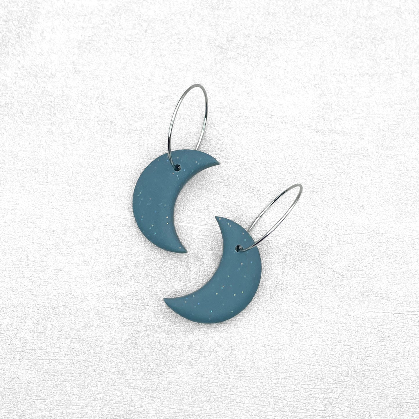 Handmade Steel Blue Moon Earrings – Spiritual Polymer Clay Earrings