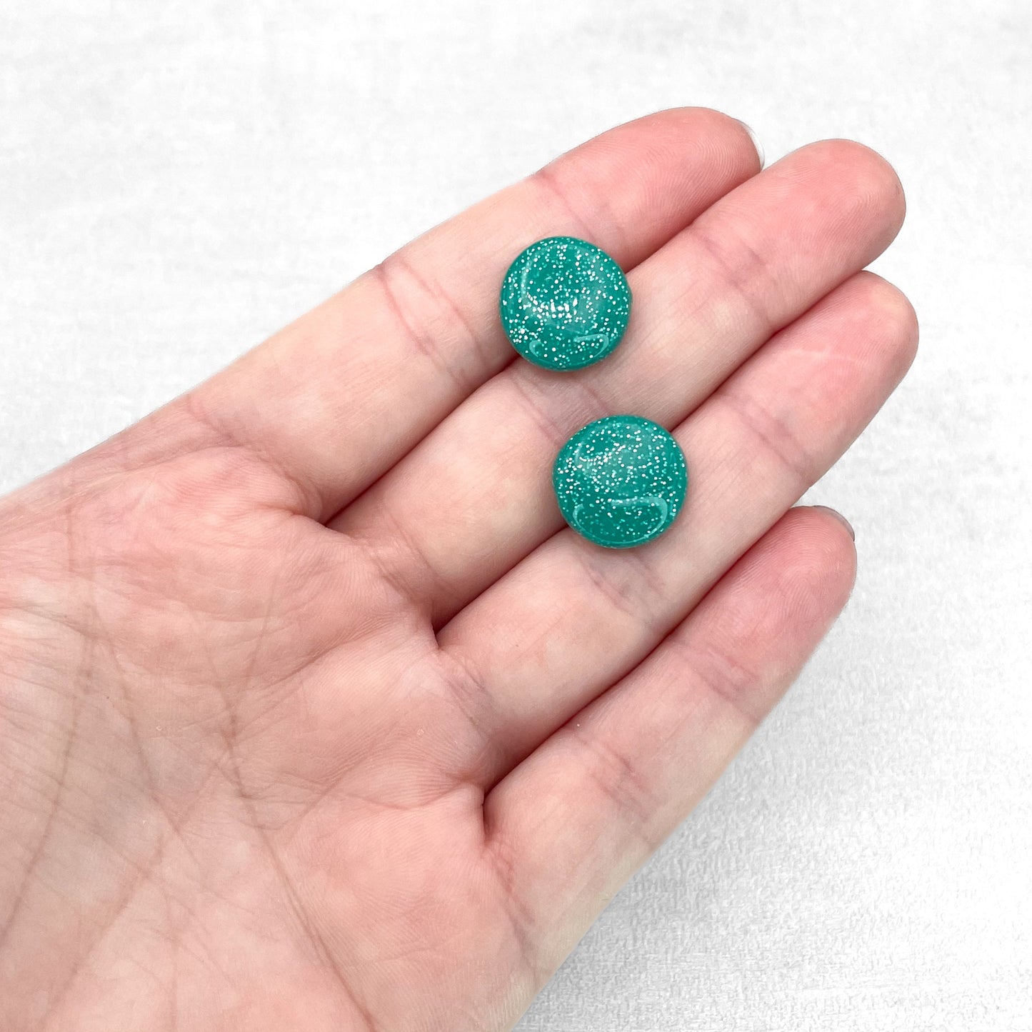 Handmade Polymer Clay Circle Stud Earrings – Teal with Silver Glitter Studs