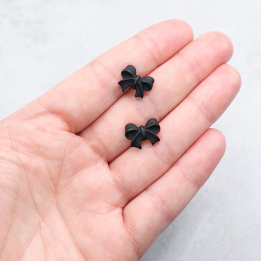 Black bow stud earrings. Handmade polymer clay stud earrings.