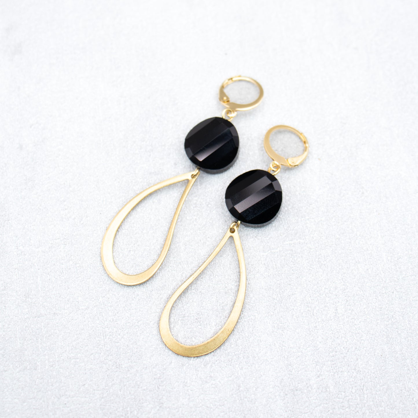 Black beads with gold charms. Handmade classic earrings.