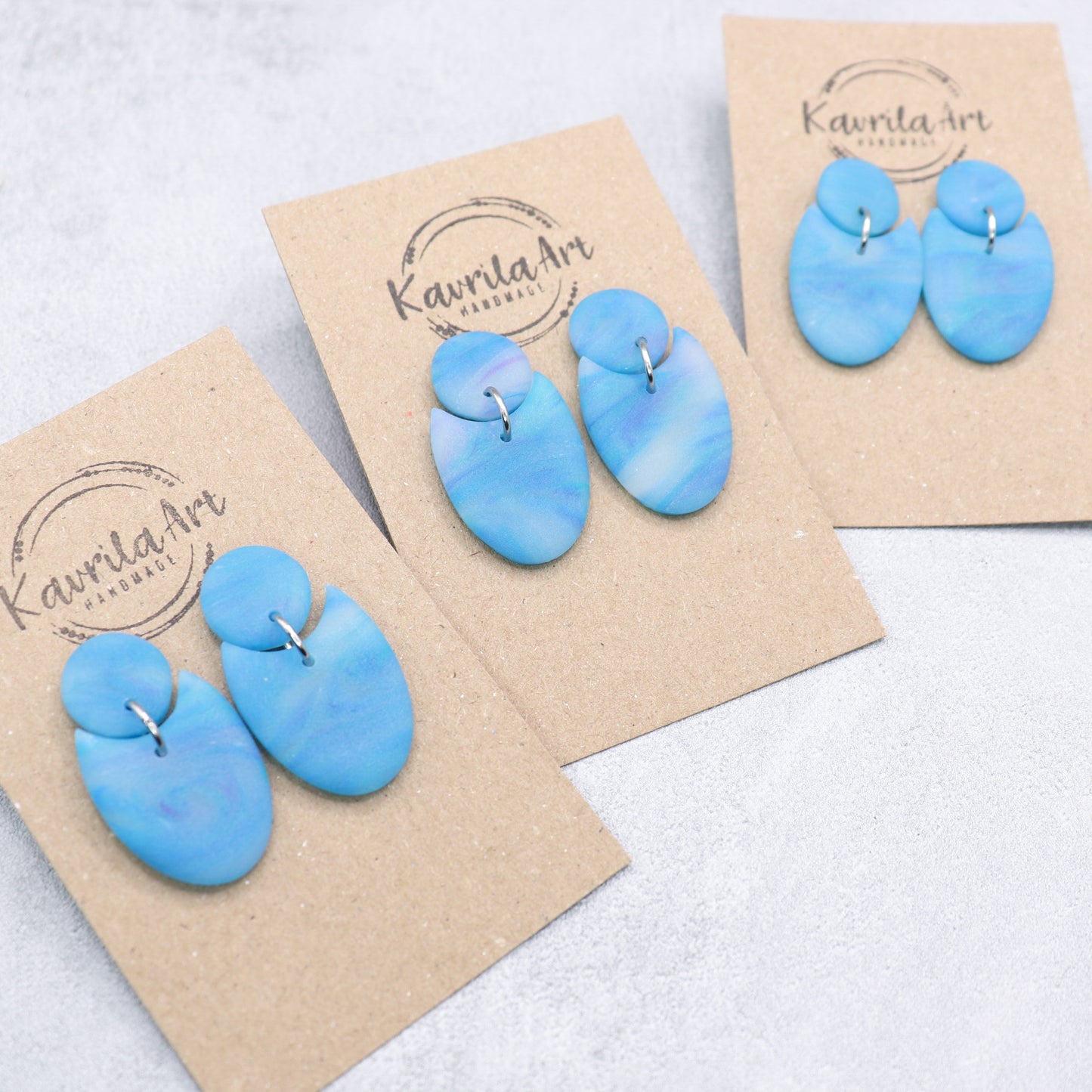Sky blue geometric earrings. Handmade polymer clay earrings.