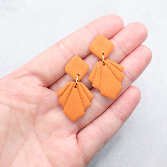 Orange geometric earrings. Handmade polymer clay earrings.